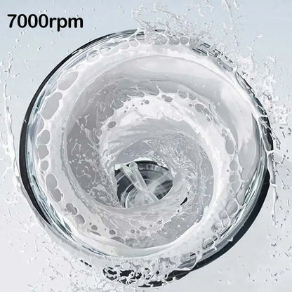 Close-up of a washing machine drum with water and bubbles, labeled '7000rpm'.